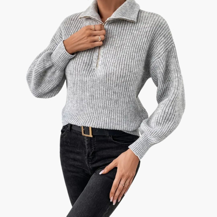 Varm och bekväm halvzip tröja för kvinnor med elegant ribbstickning, idealisk för kalla höst- och vinterdagar.