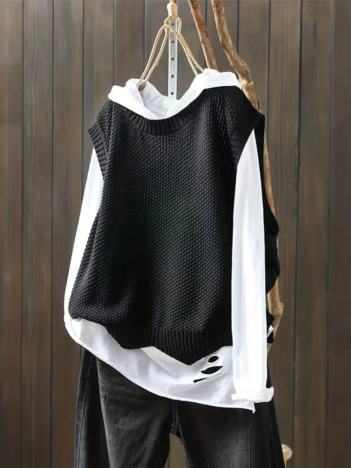 Stilren ärmlös topp för kvinnor med elegant rund hals. En modern och bekväm damtröja.