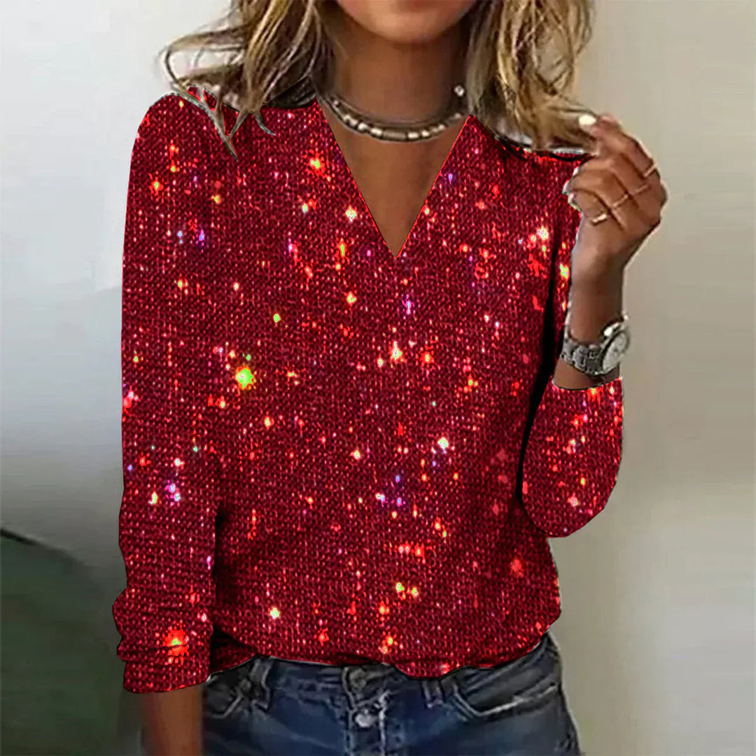 Röd glänsande V-ringad pullover för dam, stilren vardagsstil eller festkläder, i mjukt material.
