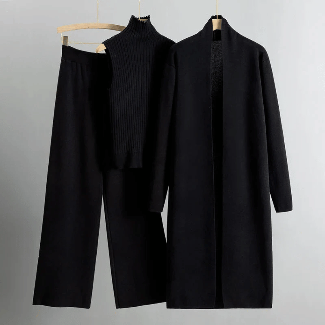 Stilrent skräddarsytt dambyxset. Elegant outfit med byxor, jacka och topp, perfekt för kvinnors kontorskläder.