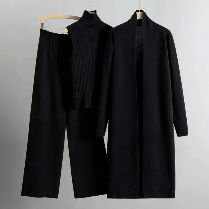 Stilrent skräddarsytt dambyxset. Elegant outfit med byxor, jacka och topp, perfekt för kvinnors kontorskläder.