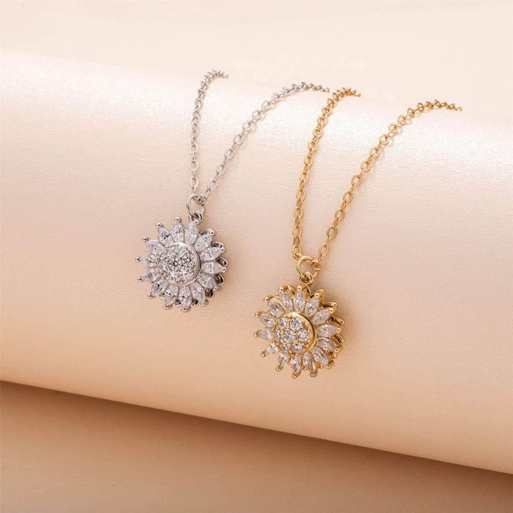 Elegant snurrande solros halsband för kvinnor i guld. Ångestdämpande smycke för positiv energi.
