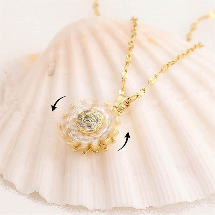 Elegant snurrande solros halsband för kvinnor, smycke som ger lugn och positiv energi. Perfekt present.