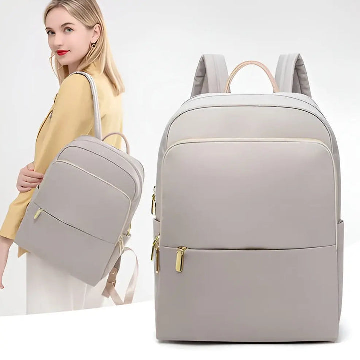 Elegant Sophia damryggsäck i khaki, en multifunktionell vardagsväska för kvinnor på språng.