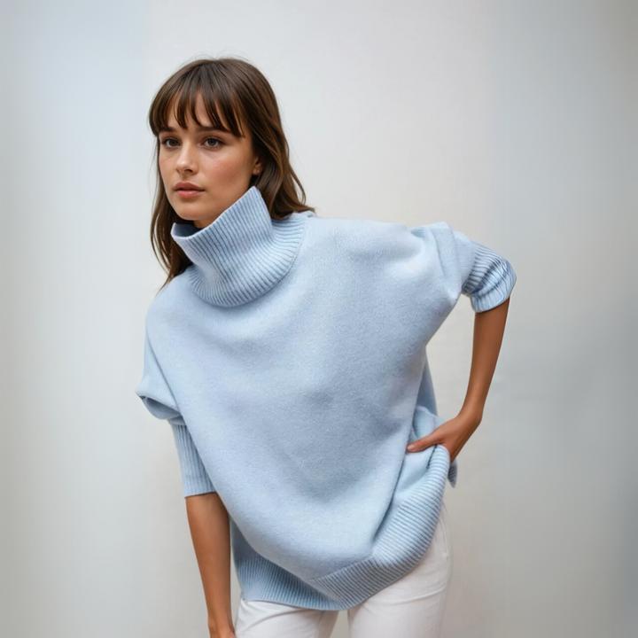 Elegant dam turtleneck pullover, stickad i hög kvalitet. Kombinerar bekvämlighet med modern stil.