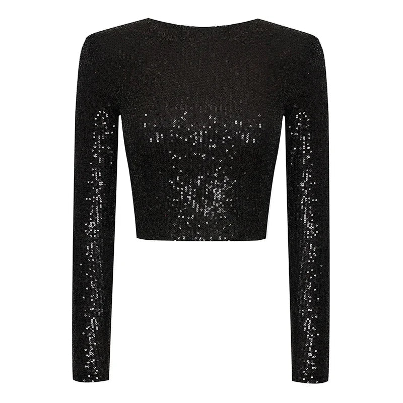 Modetopp för kvinnor: svart crop top täckt av paljetter, perfekt som glittrig festtopp.