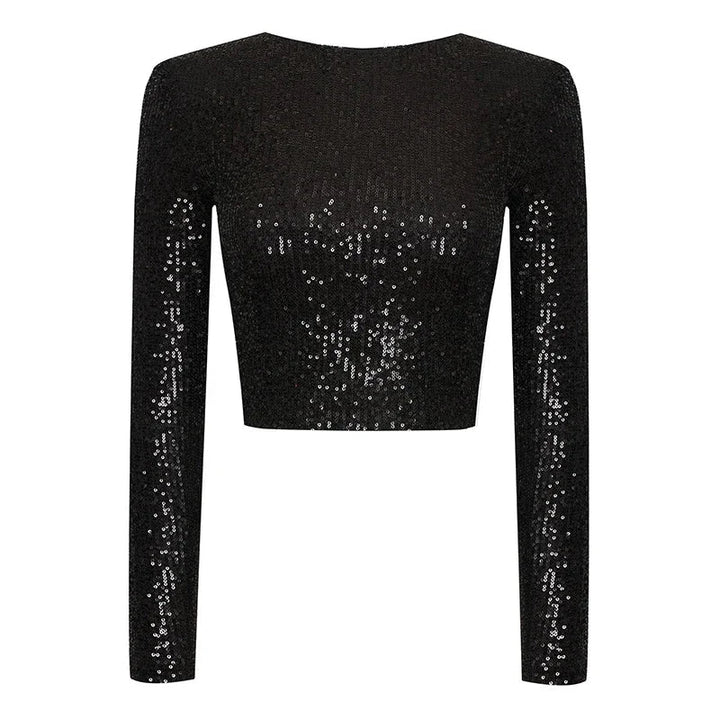 Modetopp för kvinnor: svart crop top täckt av paljetter, perfekt som glittrig festtopp.
