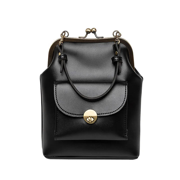 Elegant svart crossbody väska för kvinnor med justerbar axelrem, perfekt för både vardag och fest.