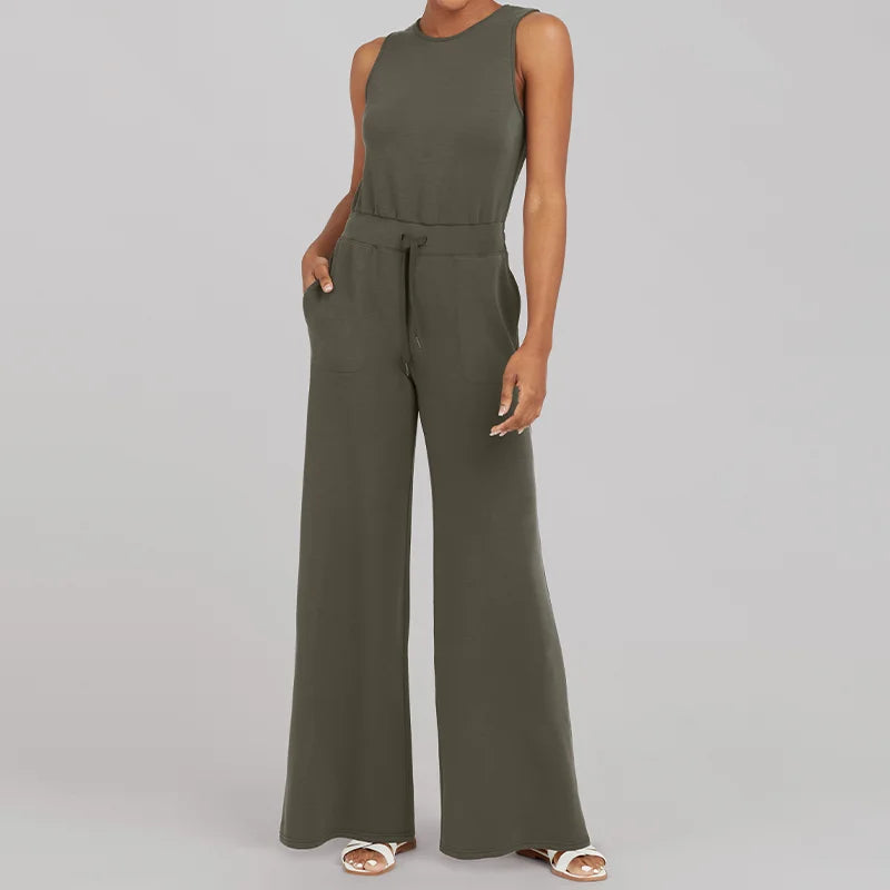 Svart byxdress dam, långärmad med midjebälte. En bekväm och elegant lösning för din garderob.