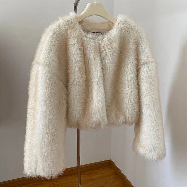 Komfortabel beige damjacka, en stilren puffjacka idealisk som varm höst- eller vinterjacka för kvinnor.