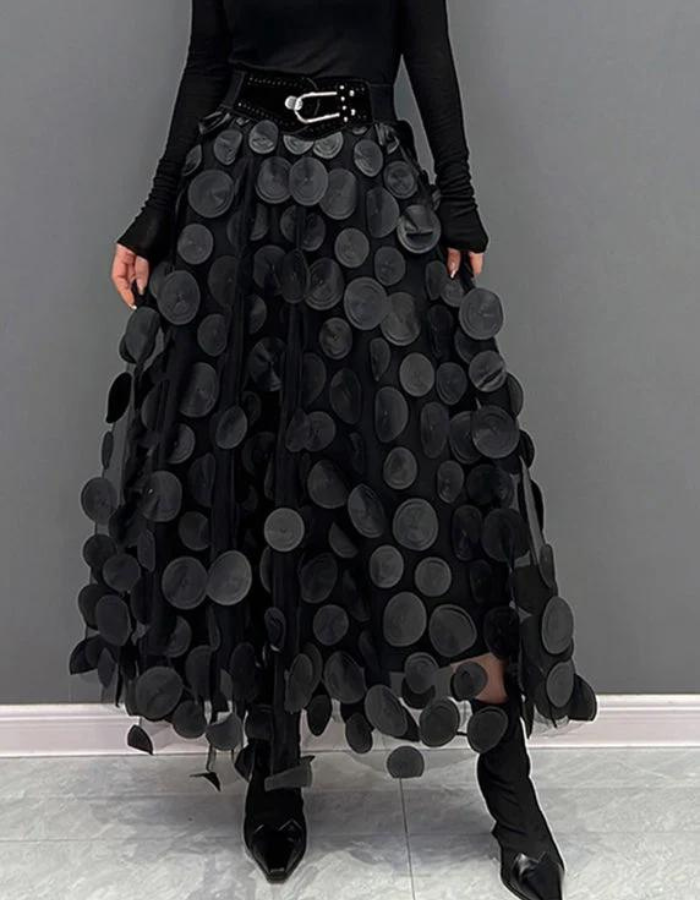 Feminine 3D prickig kjol med mjukt flödande tyg. Komfortabel damkjol i elegant design för kvinnor.