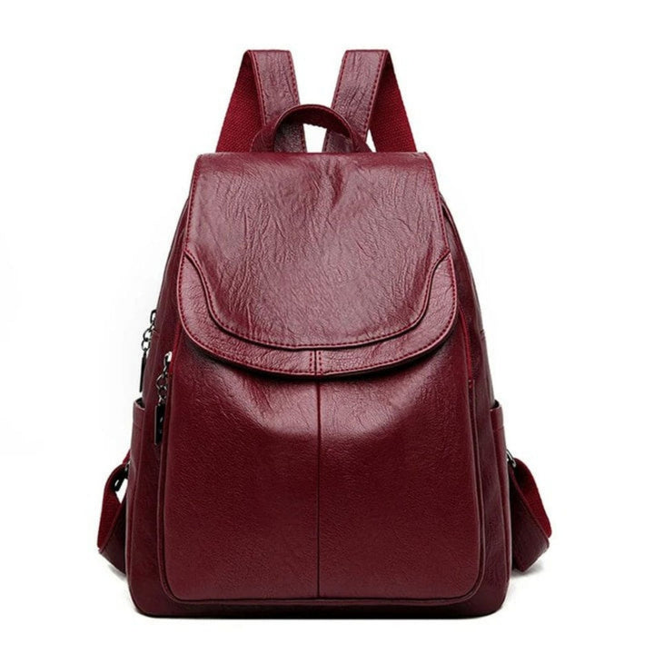 Modern damryggsäck i minimalistisk stil. Elegant och rymlig, perfekt som reseryggsäck eller damväska.
