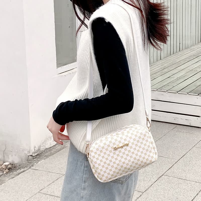 Svart elegant crossbodyväska för kvinnor, praktisk damväska. Mångsidig axelväska som present.