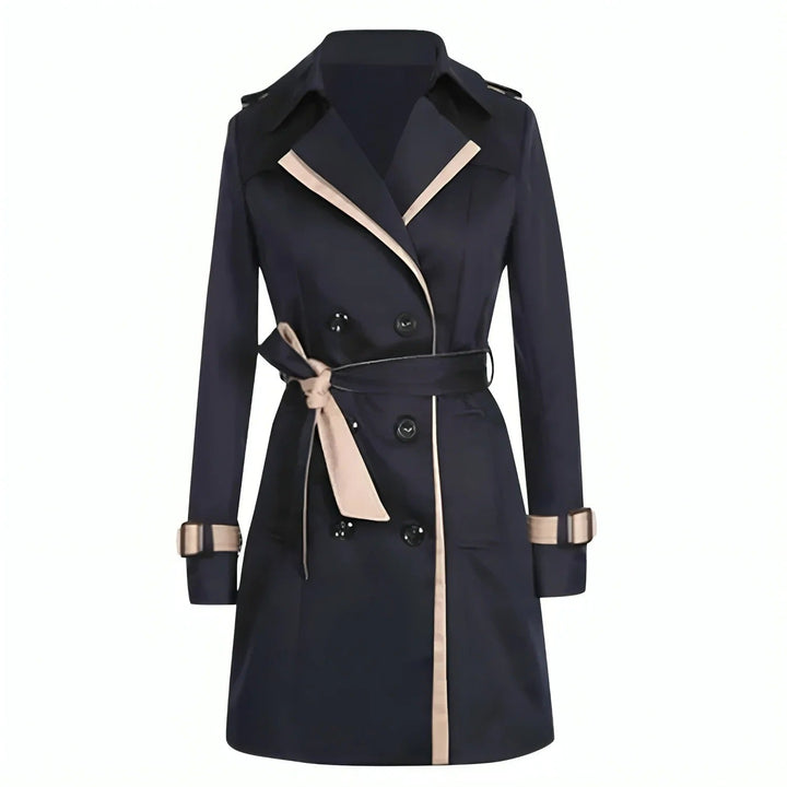 Klassisk kvinnors trenchcoat i elegant design. Tidlös kappa med bälte, perfekt som ytterplagg vår/höst.