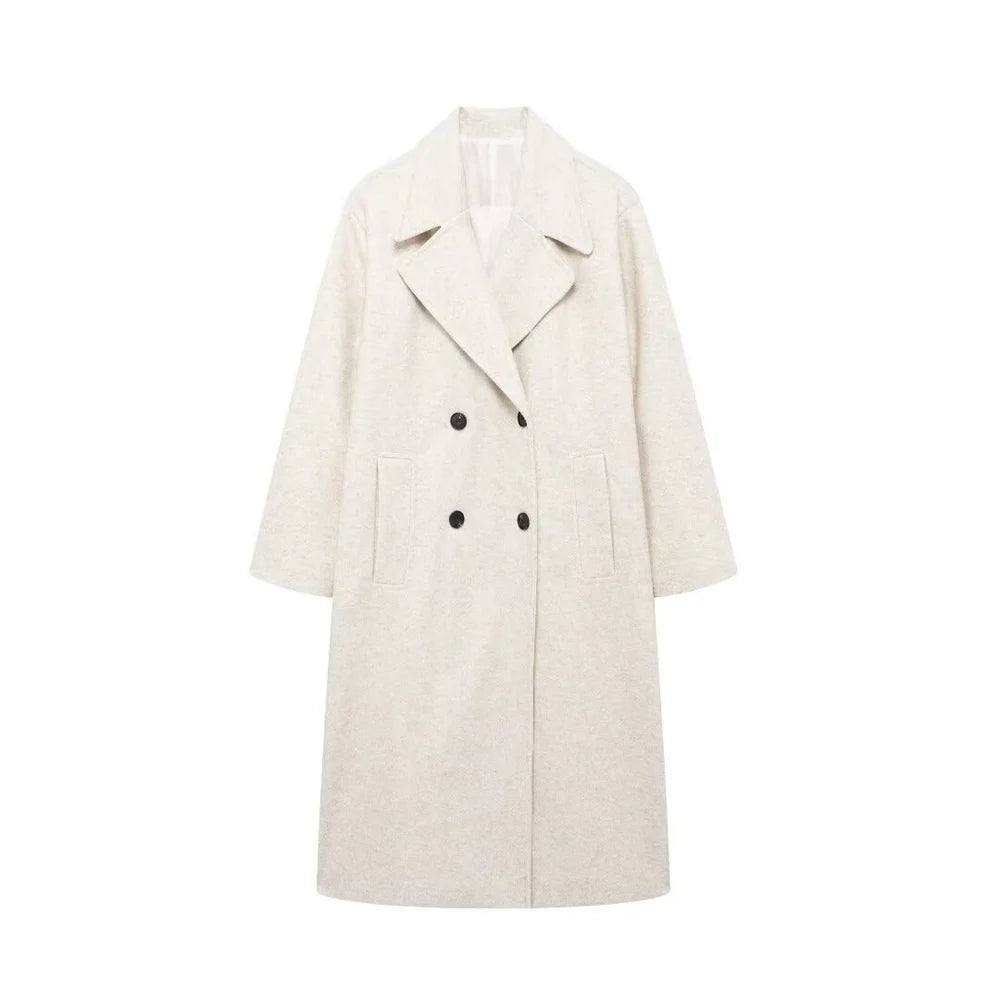 Stilren kvinnors kappa i grått. Elegant ytterplagg för kalla vinterdagar, ger både mode och bekväm värme.