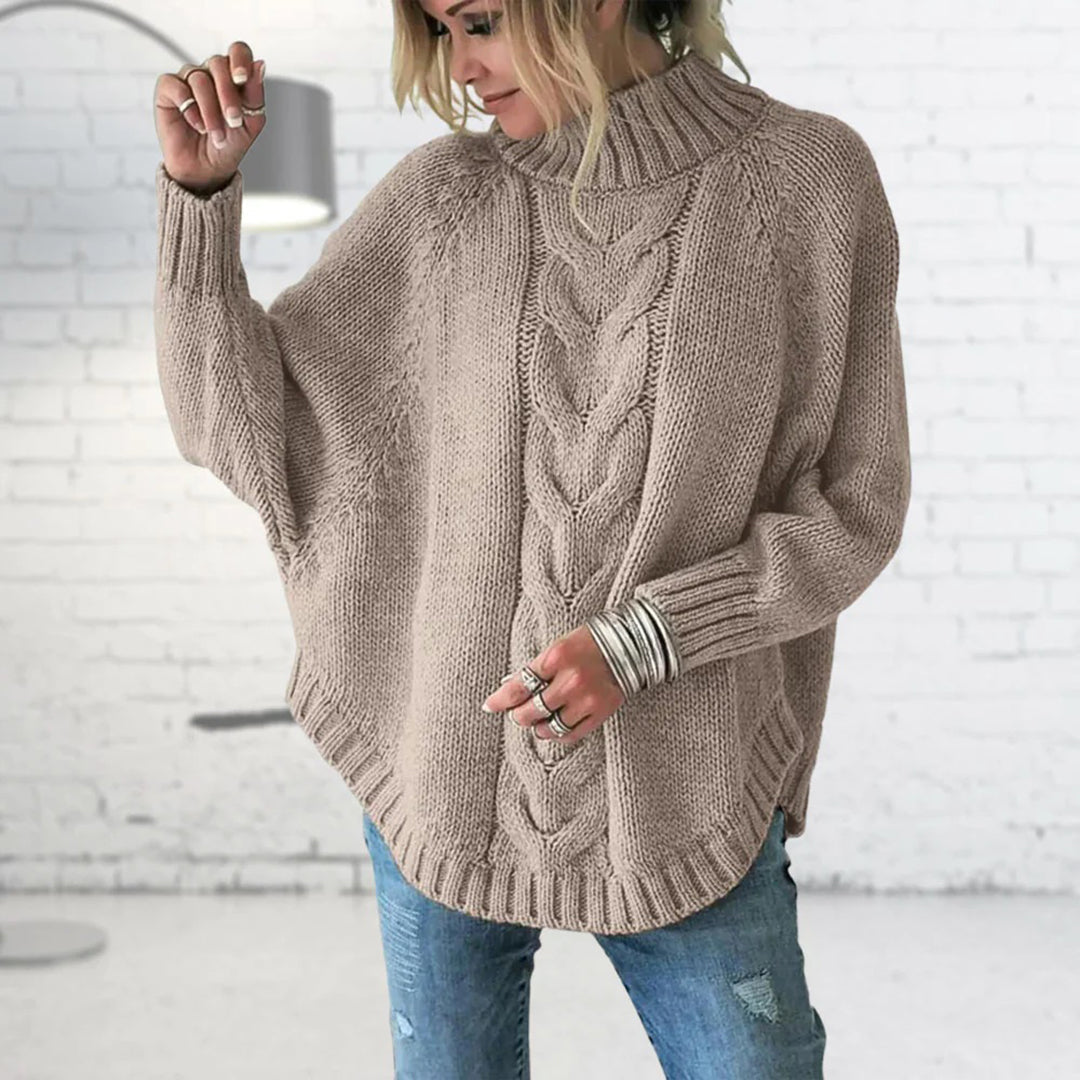 Klassisk grå långärmad vintertröja för kvinnor med rund hals. Elegant och skön i dammode.