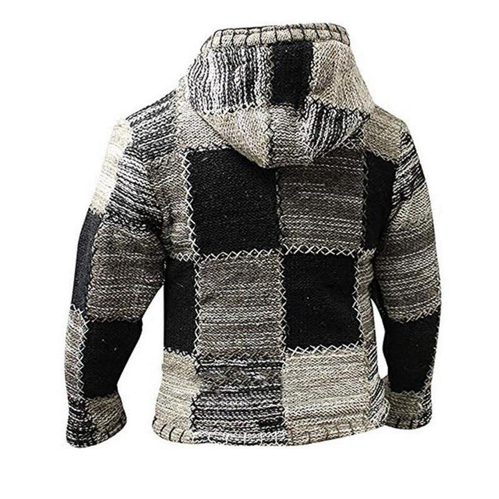 Bekväm lång damkofta i svart med lös passform, perfekt för en elegant vardagsstil.
