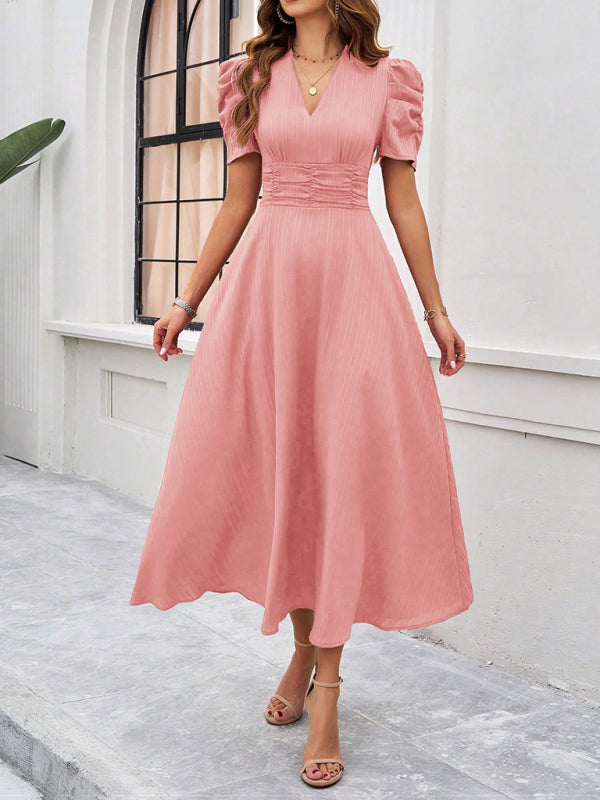 Elegant modeklänning för kvinnor, midi med puffärmar, V-hals och rynkad midja, bekväm passform.