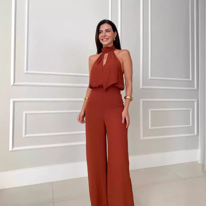 Ergonomisk damjumpsuit sommar i stilren design. Bekväm kvinnors byxdress, perfekt för eleganta event och vardag.