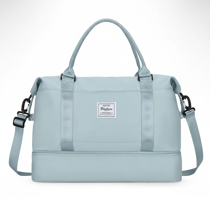 Elegant svart Travelista weekendväska, rymlig för packning till korta resor med stil.