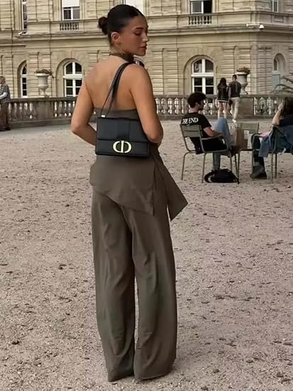 Mångsidigt elegant set för kvinnor: svart halternecktopp & raka byxor. Passar både fest- & vardagslook.
