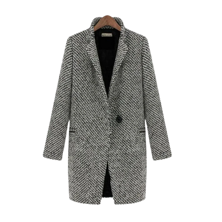 Elegant svartvit houndstooth damvinterkappa, stilrent ytterplagg för kalla dagar och höstmode.