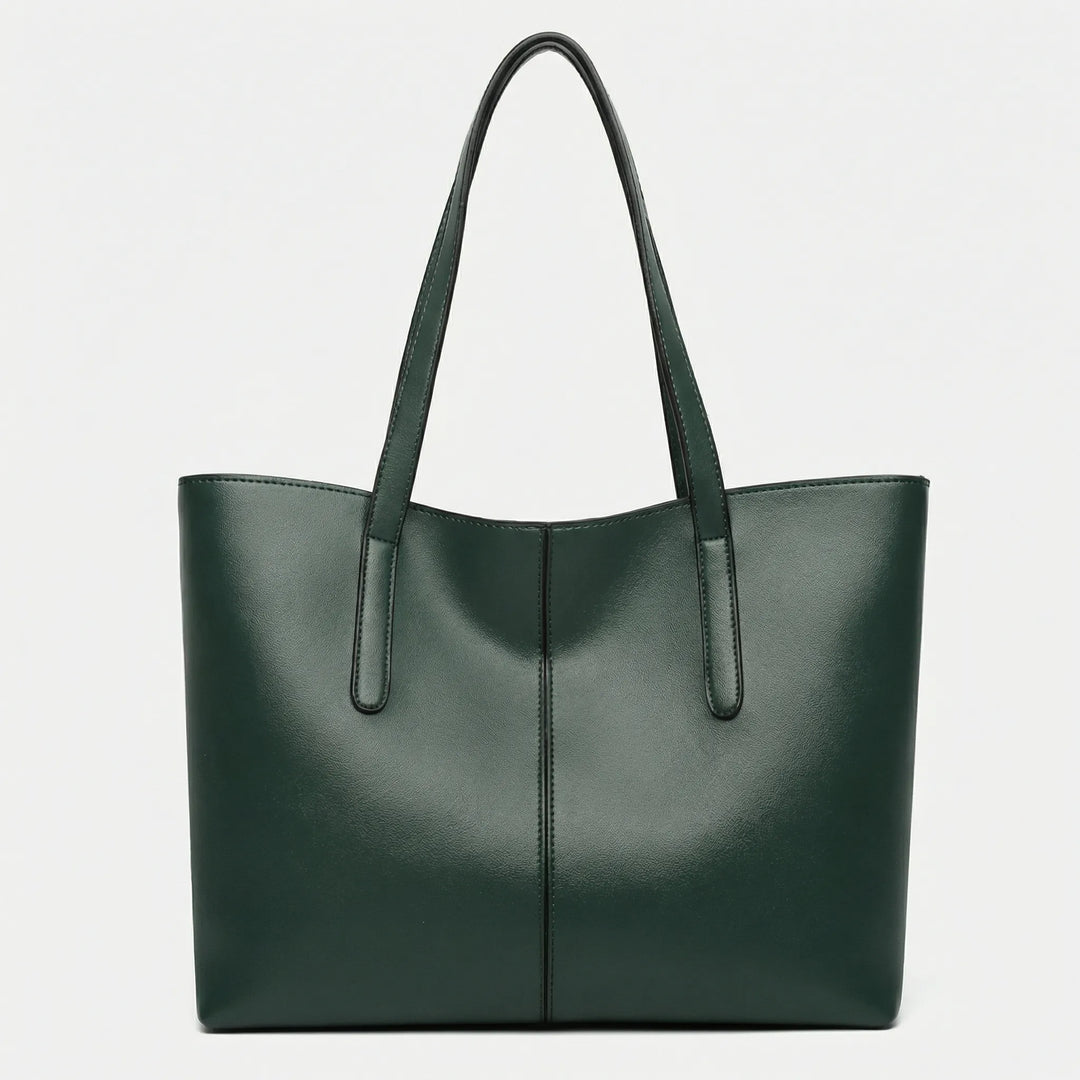 Stilren Jessy toteväska från sidan, elegant damväska med modern design som vardagsaccessoar.
