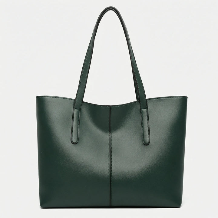 Stilren Jessy toteväska från sidan, elegant damväska med modern design som vardagsaccessoar.