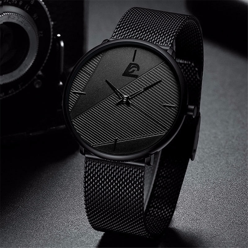 Elegant herrkvartsklocka med ultratunn boett och klassiskt läderarmband. En tidlös accessoar för alla tillfällen.