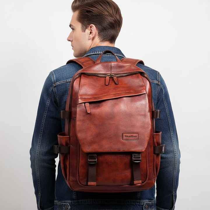 Funktionell bordeaux laptopväska i handgjort läder. Elegant ryggsäck för kontor och resor.