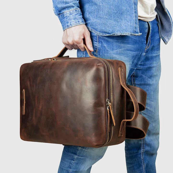 Säker unisex ryggsäck i Crazy Horse läder med stöldskydd. Trygg datorväska för arbete & resor.