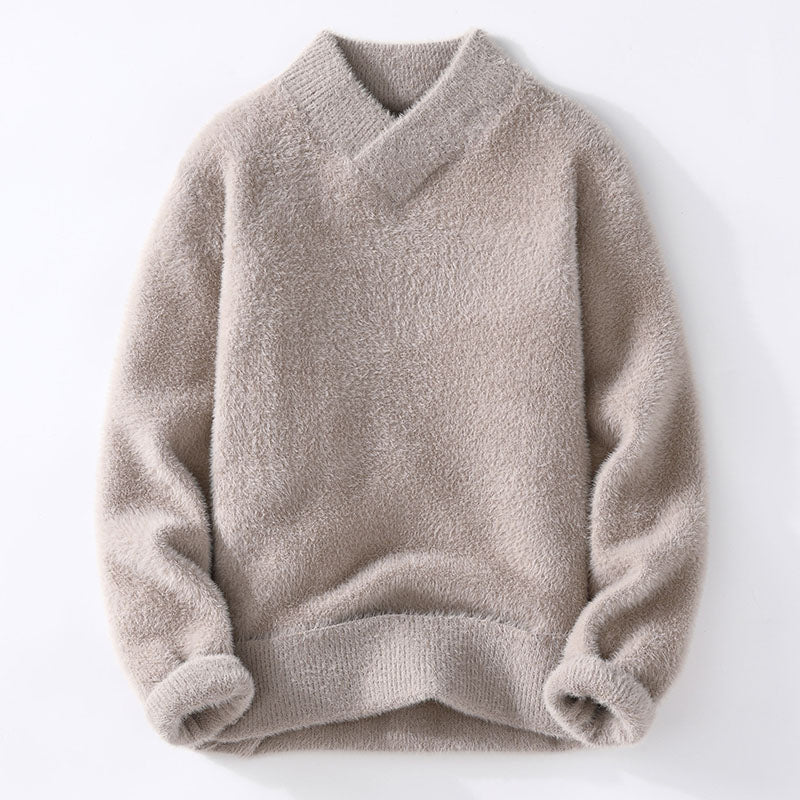 Figursydd, elegant v-ringad damtröja. Långärmad stil som passar för kontoret, hemma eller kvällen.