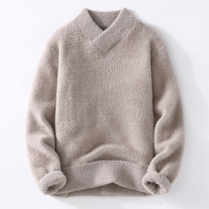 Figursydd, elegant v-ringad damtröja. Långärmad stil som passar för kontoret, hemma eller kvällen.