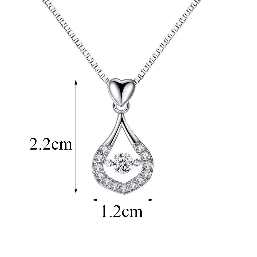 Exklusivt kristallhalsband med vattendroppsdesign. 925 sterling silver smycke för dam, med gnistrande cubic zirconia.