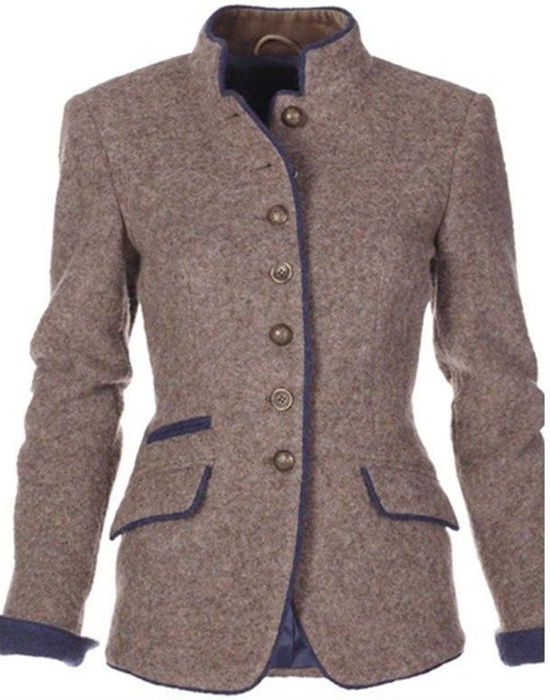 Stilren tvåfärgad damkavaj med elegant stängd krage för en sofistikerad look. Mångsidig vintage blazer.