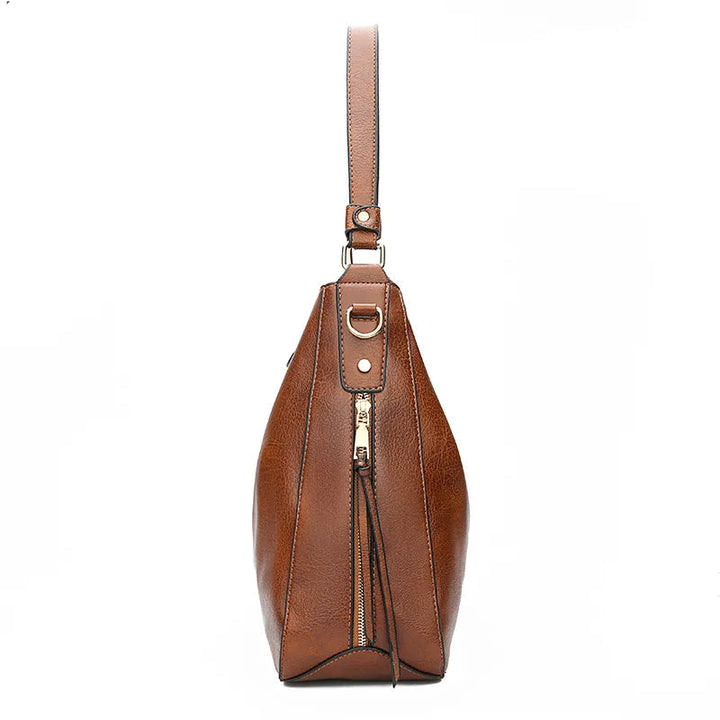 Stilren vintage damhandväska, elegant design som lyfter varje outfit, mångsidig accessoar.