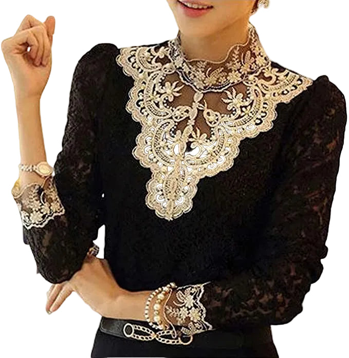 Elegant vit broderad spetsblus med långa ärmar och mesh, perfekt för fest