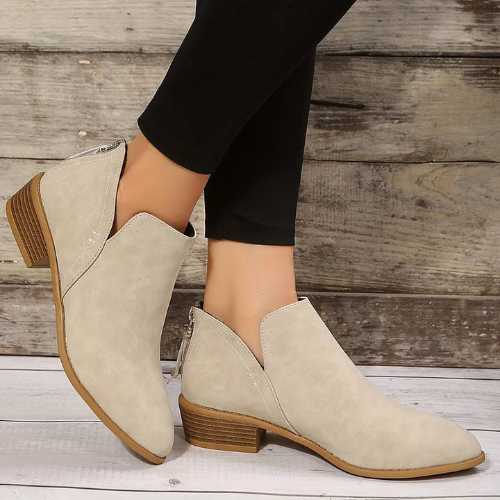 Moderna damboots i chic design, mångsidiga ankelstövlar för en trendig och komfortabel look.
