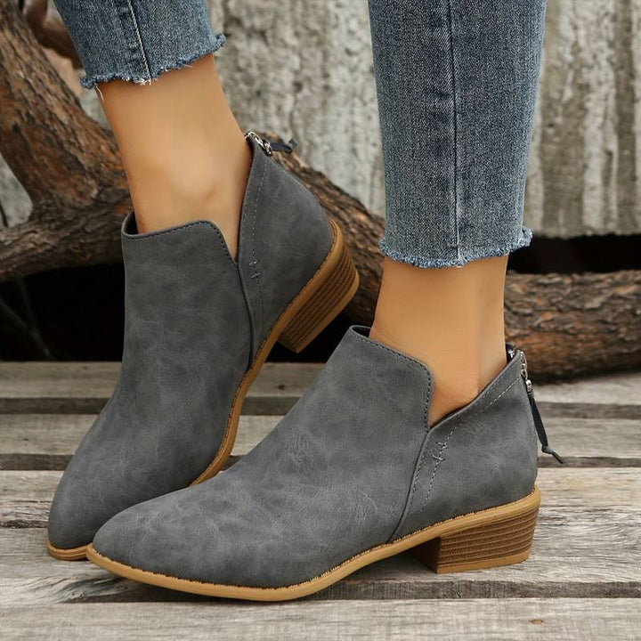 Stilrena ankelboots för dam, perfekta höstskor som kombinerar mode med vardagskomfort.