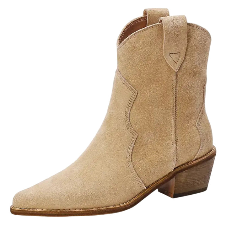 Eleganta beige damstövlar i cowboydesign med hög klack. Perfekta cowboystövlar för vardag eller fest.