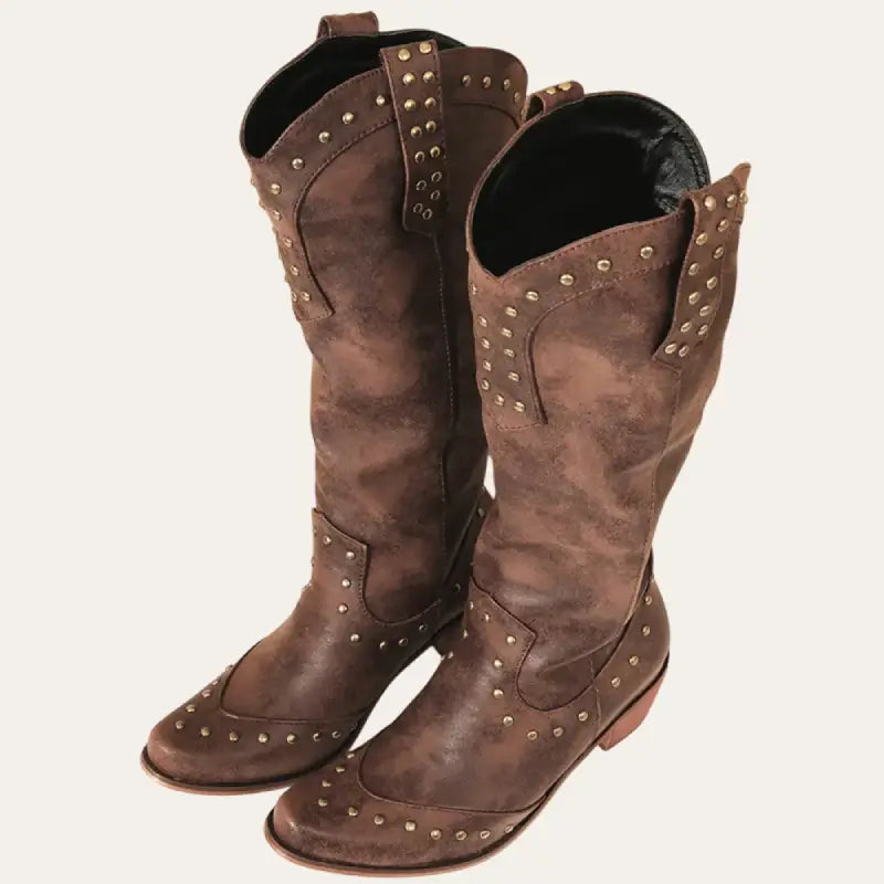 Tidlösa westernstövlar för dam, idealiska för höstmode. Klassiska cowboystövlar med elegant design.