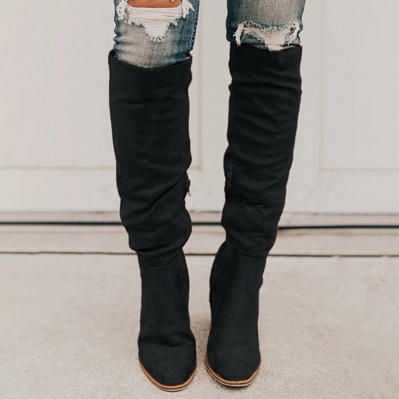 Moderiktiga högklackade stövlar för kvinnor. Essentiella för höstmode & vinterstövlar, ger en sofistikerad look.