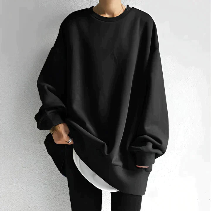 Mjuk, minimalistisk oversized damtröja för avslappnad komfort, perfekt som basplagg vår/höst.