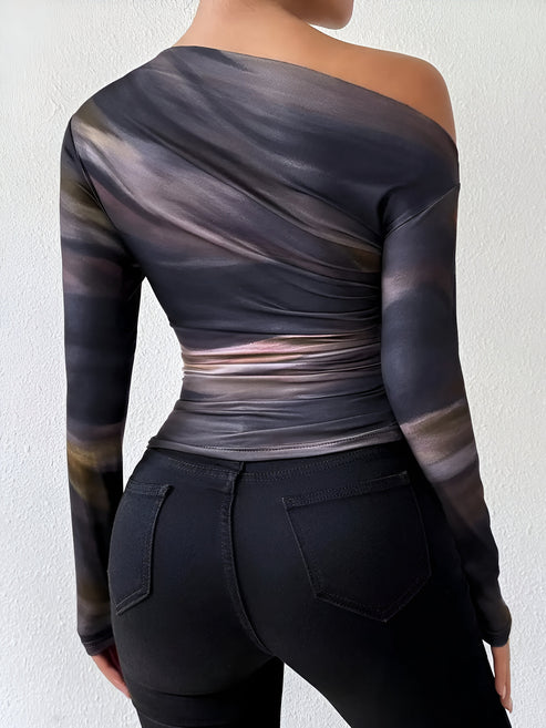 Elegant långärmad dam t-shirt, idealisk för en avslappnad men stilfull look. Ett mångsidigt vardagsplagg.