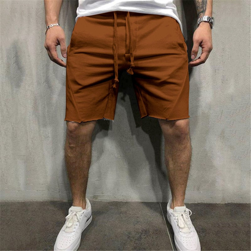 Lediga herrshorts, enfärgade och snygga, perfekta för både träning och fritid.