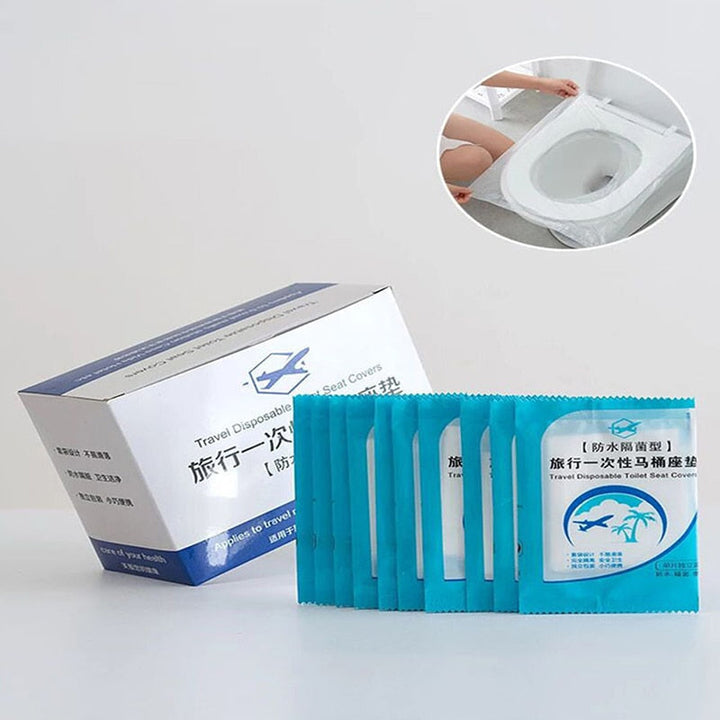 Förpackning med sanitära engångs toalettsitsskydd. Oumbärliga för resor och god personlig hygien.