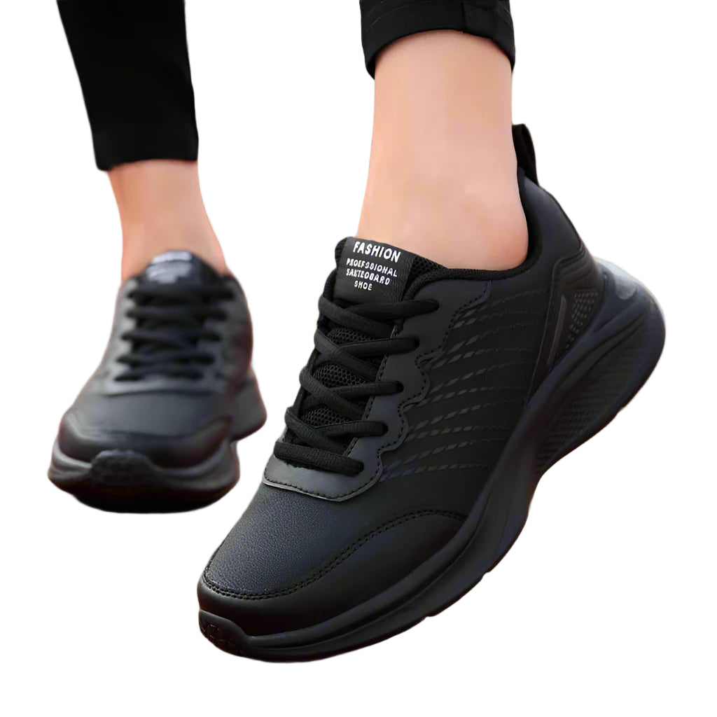 Ergonomiska arbetsskor för dam i andningsbart material, idealiska för restaurang och service.