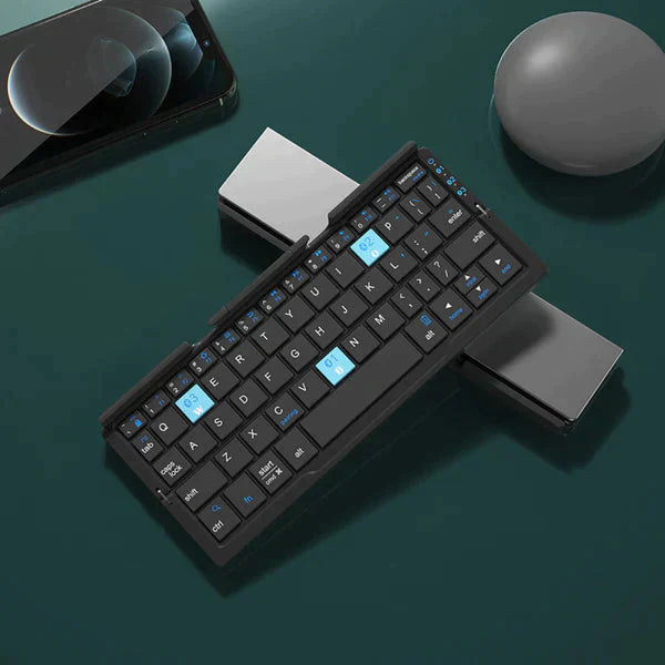 Slimmat trådlöst Bluetooth-tangentbord, svart design för mobila enheter & surfplattor, resvänligt för produktivitet.