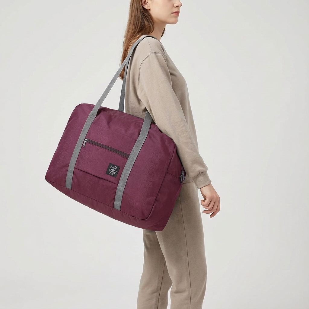 Kompakt, vattentät och fällbar reseväska FoldLite. Perfekt lättvikts duffelväska för unisex handbagage.