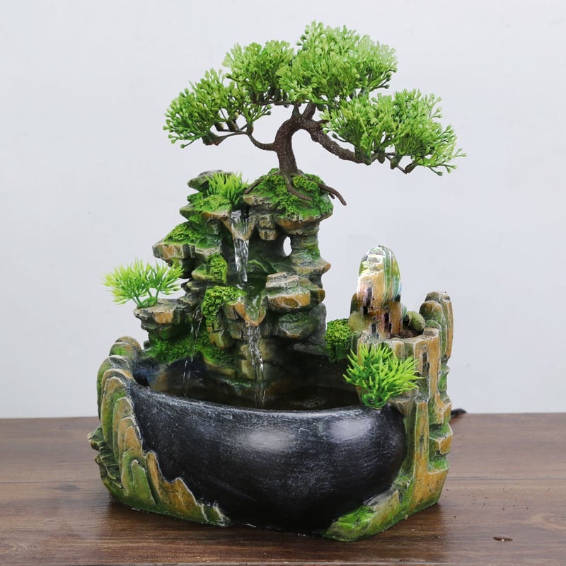 Elegant Feng Shui vattenfall heminredning, symboliserar pengar & rikedom. En lyxig bordsdekoration.